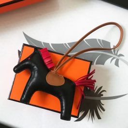 Hermes - Birkin bag, scarf and Rodeo horse charm.